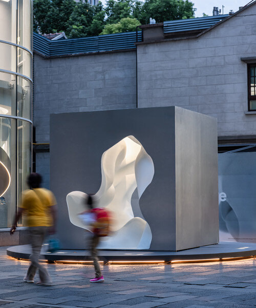 atelier ping jiang and EID arch sculpt a fluid and cavernous 'micronature' in shanghai