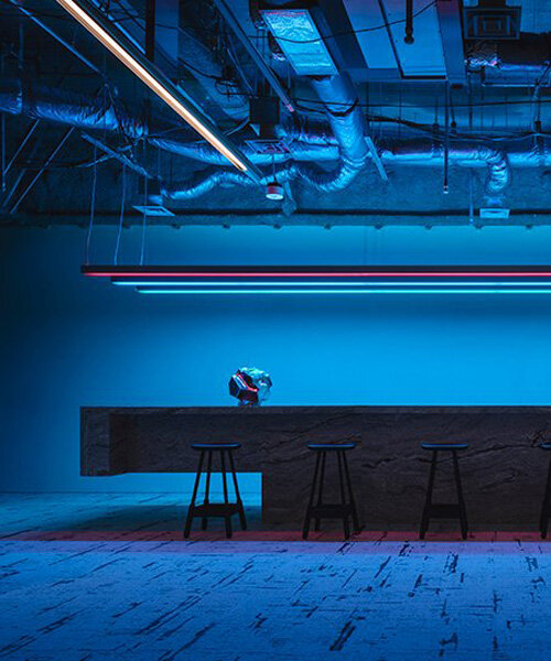 minimal lines & radiant fluorescent lighting enliven I IN’s futuristic office in tokyo
