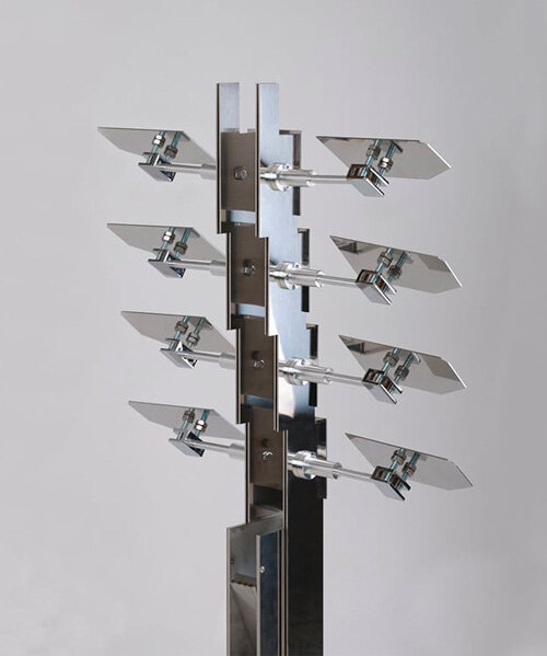 stainless steel landscape lamppost prompts subtle shadow + light interplay