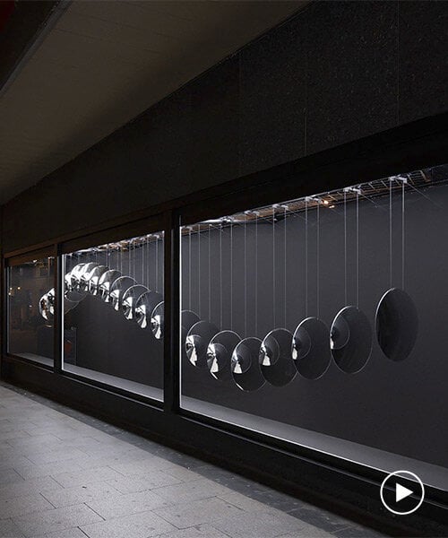 urban artist SpY unveils his first kinetic sculpture made of 20 surveillance mirrors